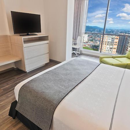 Sonesta Hotel Ibagué 外观 照片 A bedroom at the hotel