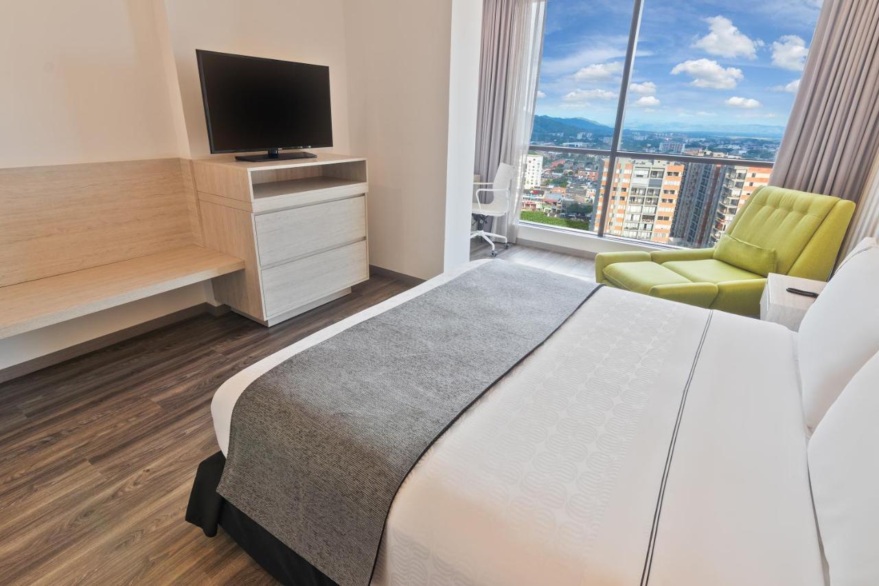Sonesta Hotel Ibagué 外观 照片 A bedroom at the hotel