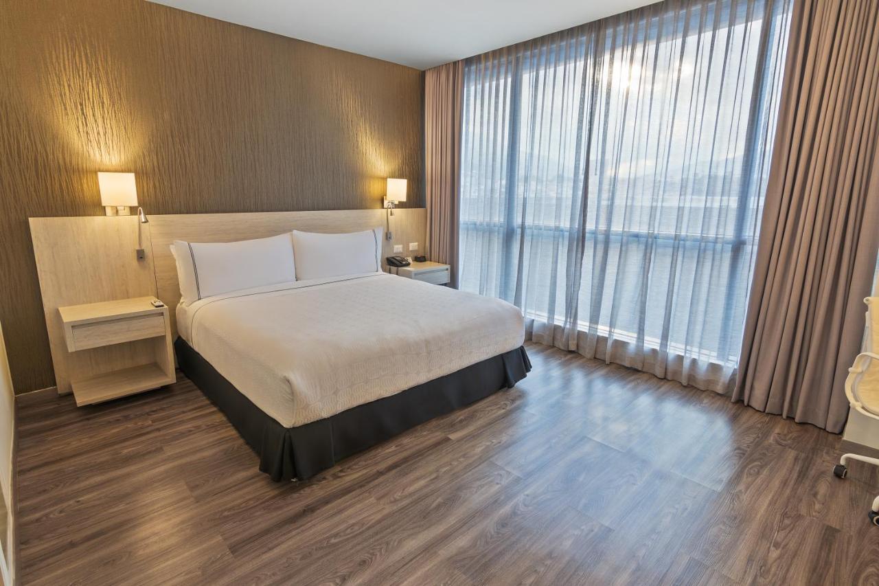 Sonesta Hotel Ibagué 外观 照片 A bedroom at the hotel